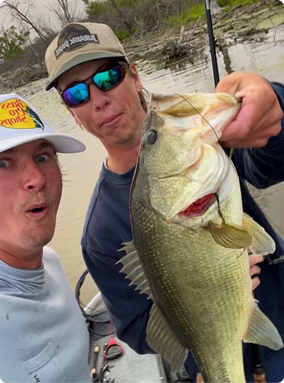 Captain Max and guest thrilled about a big bass