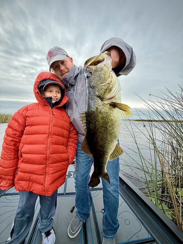 Father and son with a big catch